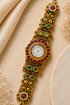 Women's Gold-Tone Ethnic Bracelet Watch with Gemstone Embellishments | Traditional Design, Red & Green Stones, Floral Motifs, Analogue Dial, Adjustable Chain